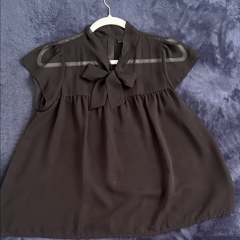 54# Elegant Black Blouse